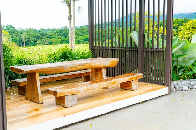 Outdoor patio deck and chair with mountain hill background