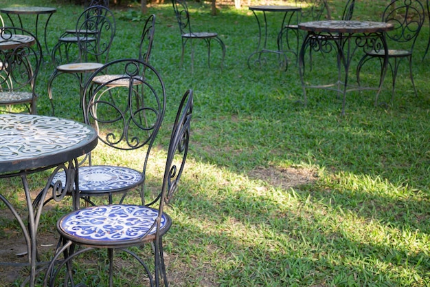 Outdoor seats in green garden