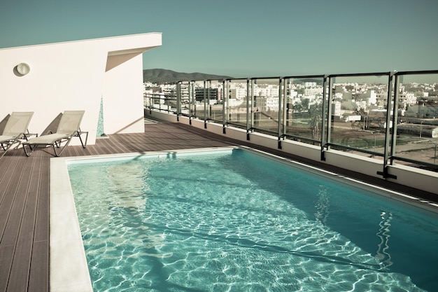 Outdoor swimming pool at a house roof