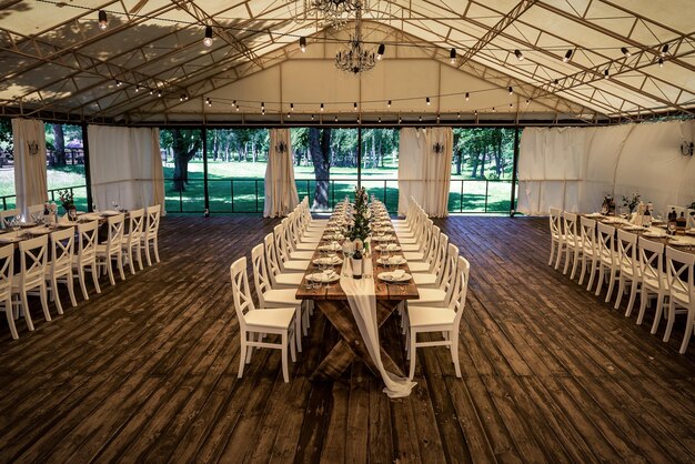 Outdoor tent banquet decor for wedding day