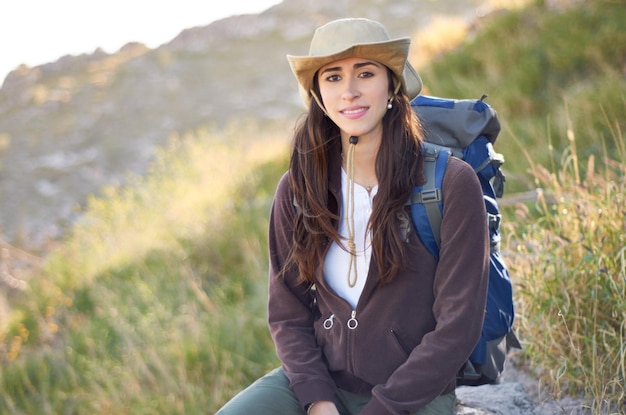 Outdoors girl A gorgeous young hiker looking at the camera