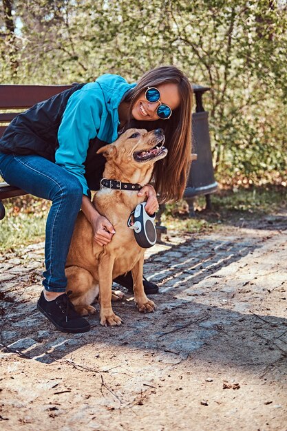 Outdoors lifestyle portrait of a beautiful girl. Enjoying nature.