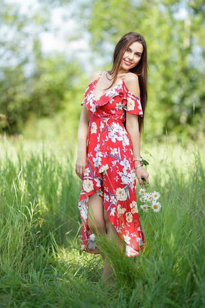 Outdoors portrait of beautiful brunette woman 