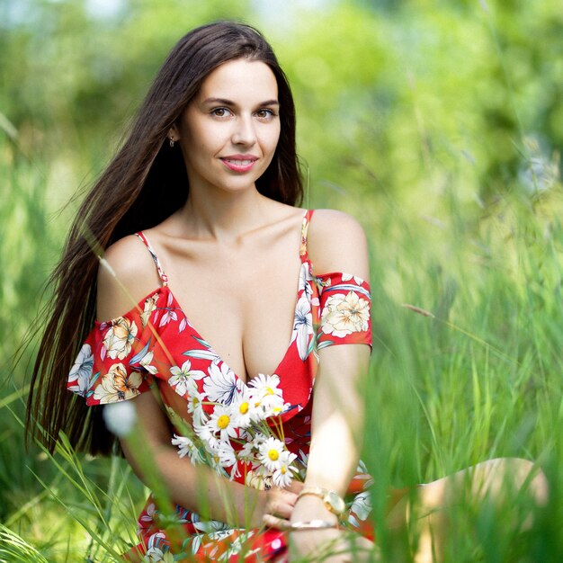 Outdoors portrait of beautiful brunette woman 