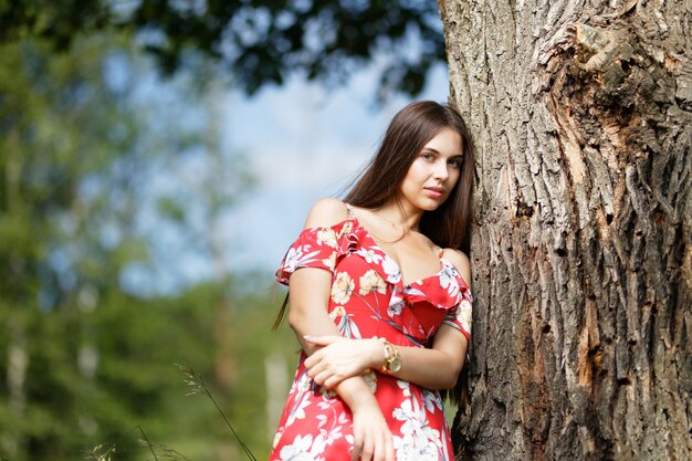 Outdoors portrait of beautiful brunette woman 