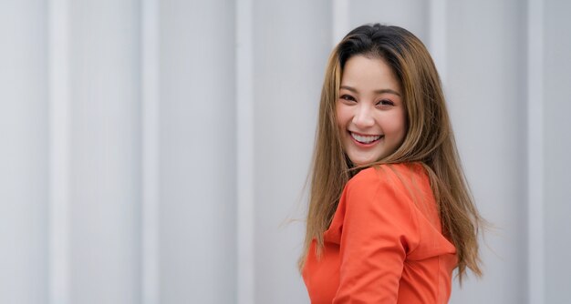 Outdoors portrait of Happy young woman