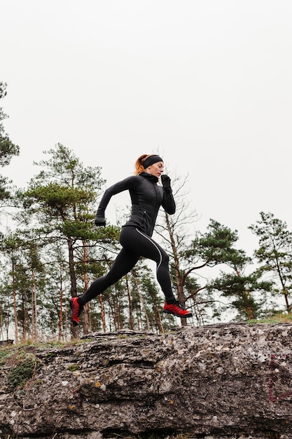 Outdoors running workout low view in daylight