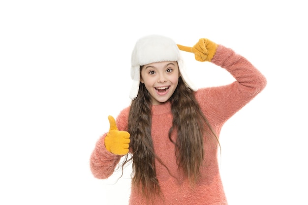 Outerwear piece finally winter holidays enjoy christmas vacation good mood any weather warm apparel for cold weather childhood happiness and joy fur earflap hat happy little girl loves winter