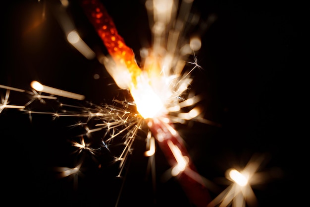 Outoffocus Lightening sparkler on the black background