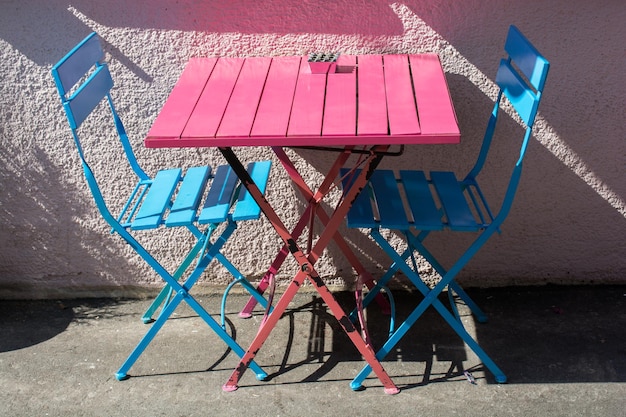 Outside restaurant or cafe Empty seats chairs near table