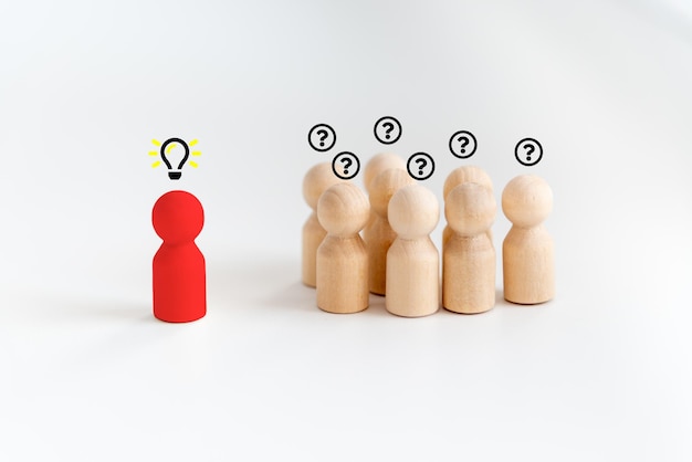 Outstanding red people model with light bulb icon and question mark symbol Concept creative idea and innovation Human resource and talent management