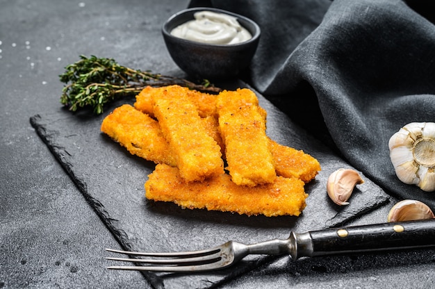 Oven baked crumbed fish sticks made from white fish