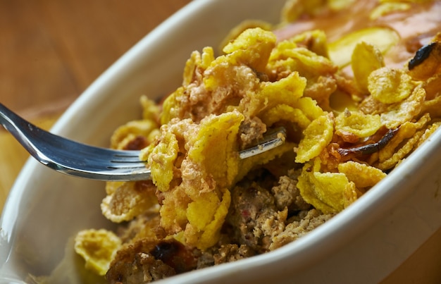 Oven Baked Frito Chili Pie, Sprinkle about half the shredded cheese atop the Fritos