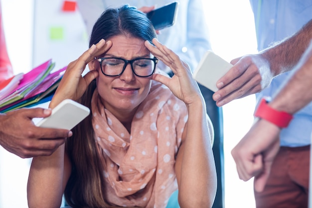 Overbooked businesswoman