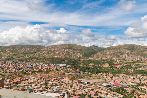 overcrowding slum built on a hill underdevelopment in south america poverty