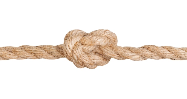 Photo overhand knot tied on thick jute rope isolated