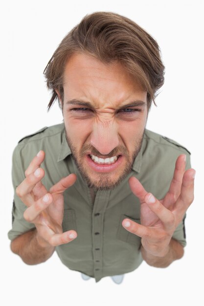 Photo overhead angle of frustrated  man