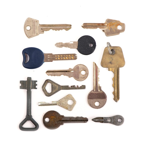 Overhead of many different keys in oder on a white background concept