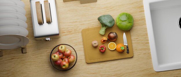 Overhead A modern wood kitchen tabletop with vegetables and fruits slides on a chopping board