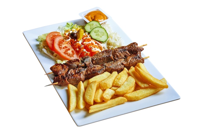 Overhead  shot of Beef brochette on plate. Isolated on white with clipping path