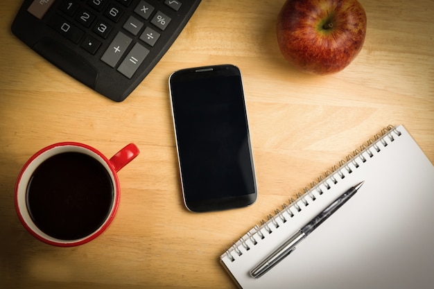 Overhead of smartphone with pen