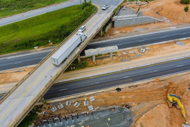 Overhead view of under construction works in highways of a bridge over a 85 interchange freeway