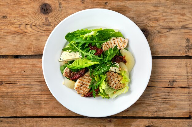 Overhead view of salad with roasted turkey