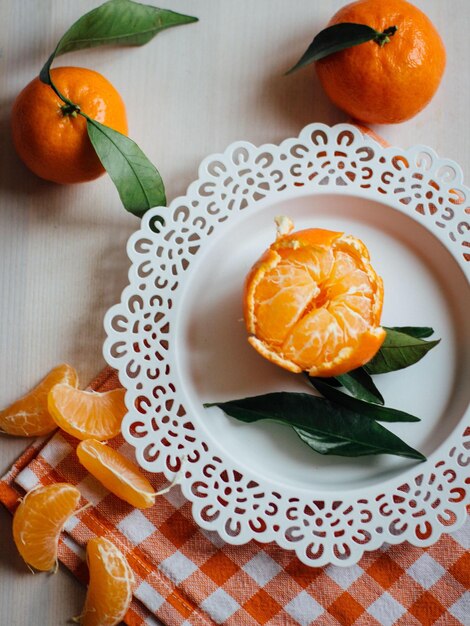 overhead view of tangerine on plate