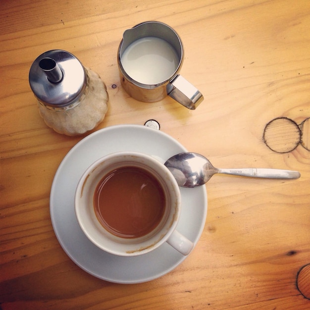 Overhead view of tea cup on table