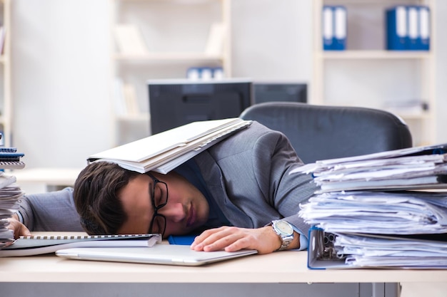 Overloaded with work employee under paperwork burden