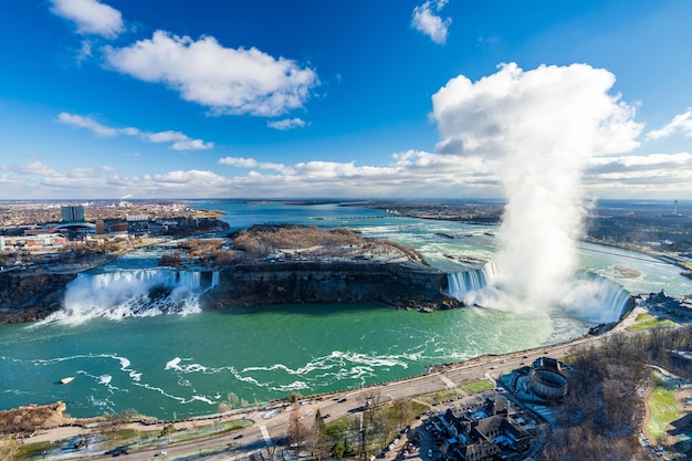 Overlooking the Niagara Falls American Falls and Horseshoe Falls in a sunny day