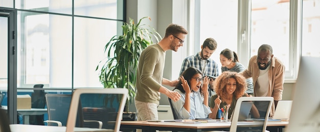 Overlyexcited office workers feeling joyful about work