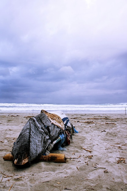 overturned boat on the beach