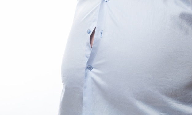 overweight man showing his belly