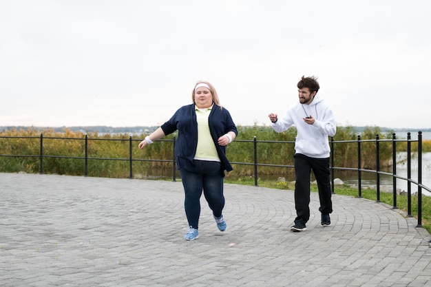 Overweight Woman Running Outdoors