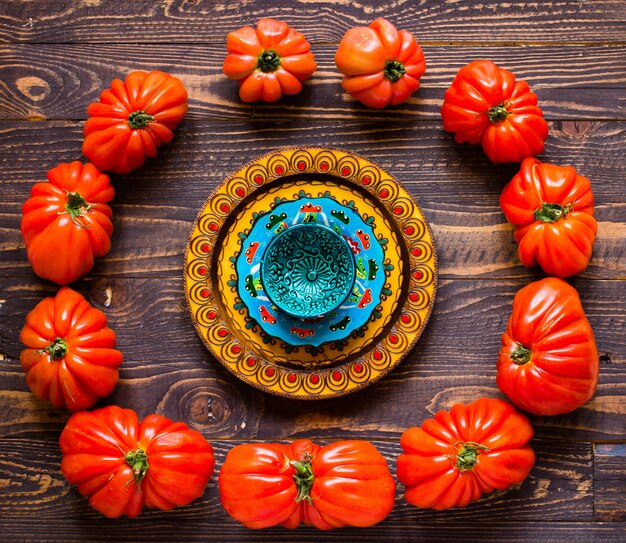 Ox heart tomatoes, on rustic wooden table