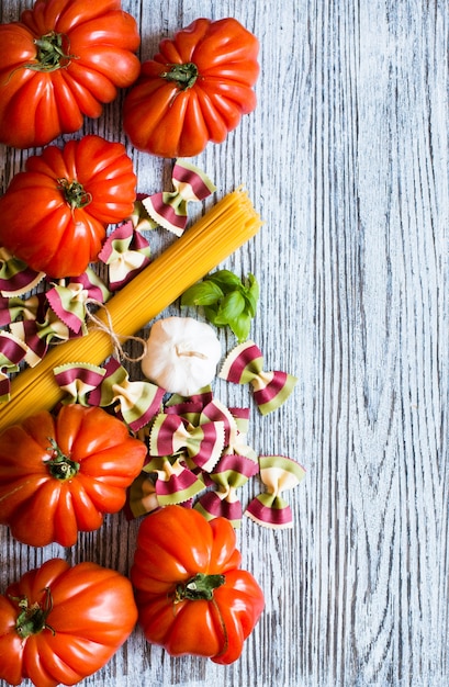 Ox heart tomatoes on wood