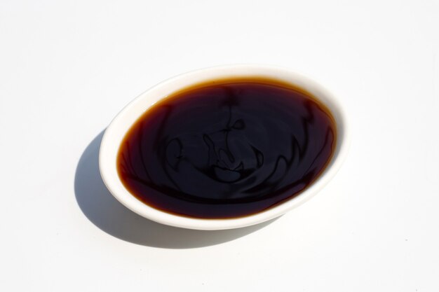 Photo oyster sauce on white background.