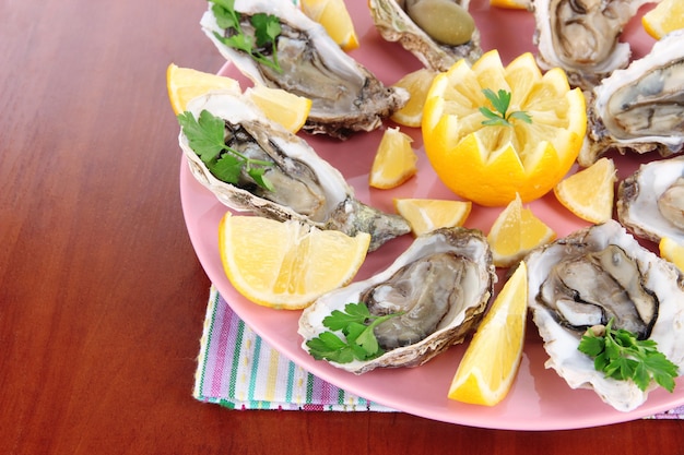 Oysters on wooden table