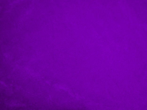 Paarse fluwelen stof textuur gebruikt als achtergrond Violette kleur panne stof achtergrond van zacht en glad textiel materiaal verpletterd fluweel luxe magenta toon voor zijde