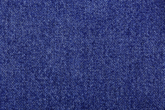 paarse kleur jeans textuur fabrieksstof op witte achtergrond close-up