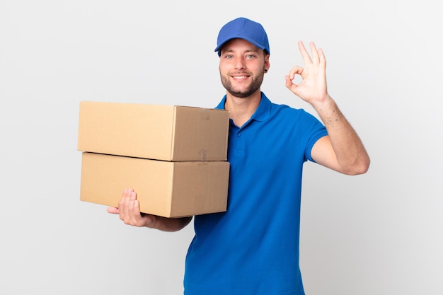 Package deliver man feeling happy, showing approval with okay gesture