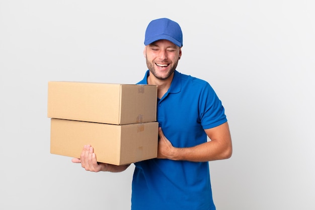 Package deliver man laughing out loud at some hilarious joke