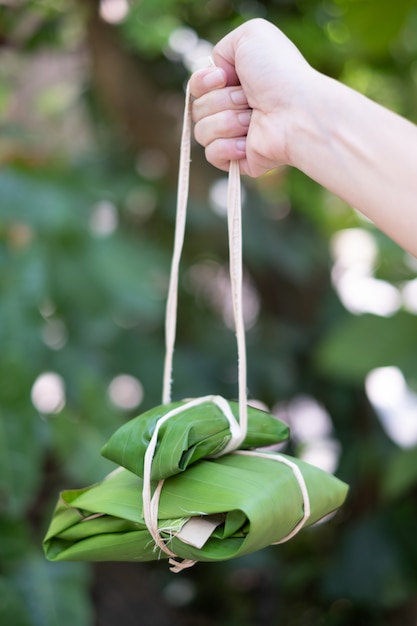 Package made from green banana leaf and nature rope