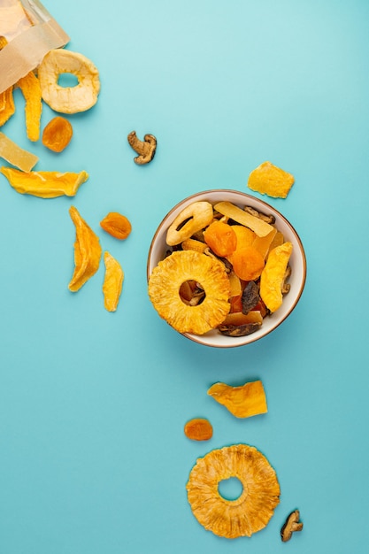 Photo package with assorted vegan jerky, bowl, top view.