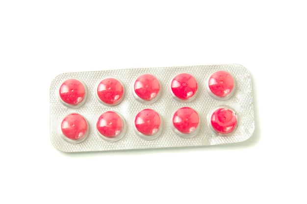 Package with pink tablets