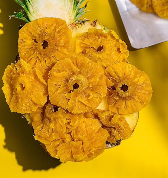 Packaged Dried Pineapple on Yellow Background