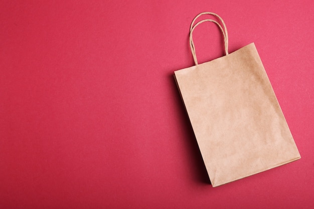 Packages for shopping on a colored background top view