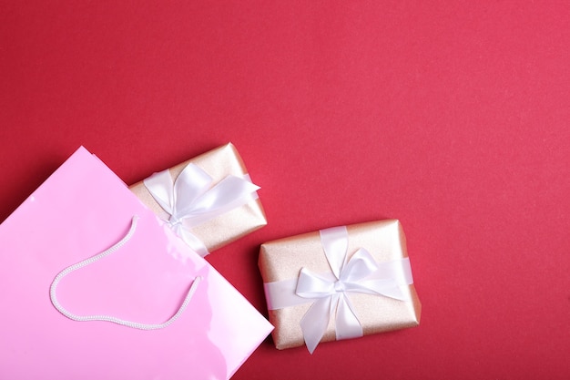 Packages for shopping on a colored background top view