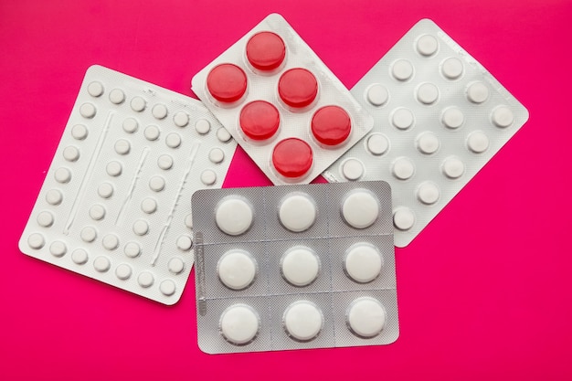 Packaging of tablets and pills on the table. Medicine